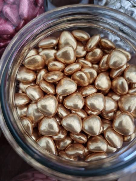 Nos Dragées Métallisées au coeur chocolat noir - Dragées Rosière